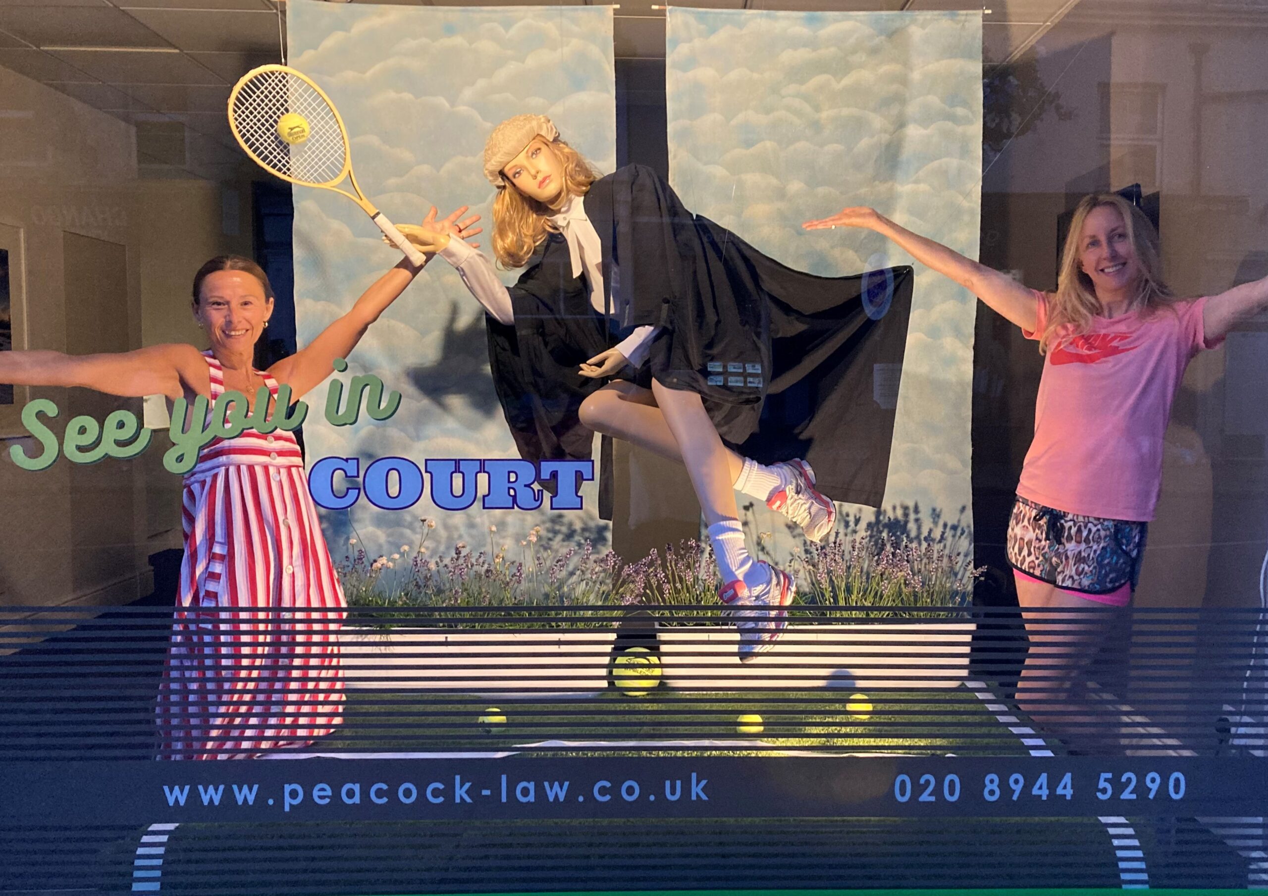 Peacock & Co Tennis window entitled See you in Court, with tennis playing barrister mannequin 