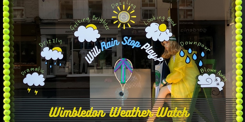 Wimbledon Tennis window for 2024 Wimbledon weather watch barometer with model in an umpire's chair wearing poncho.